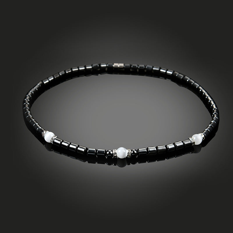 Bijou noir en hématite d’ancrage et d’équilibre